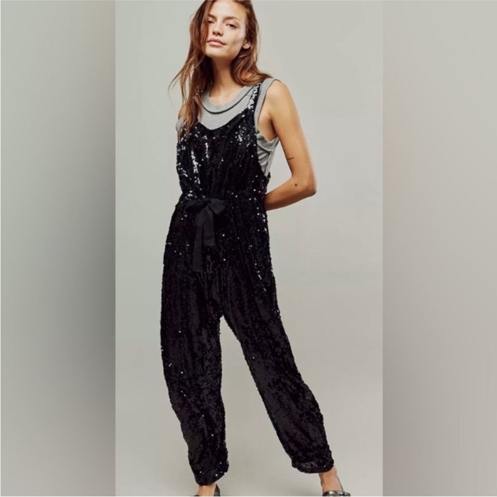 Free People Sequin Jumpsuit in black. Size XS